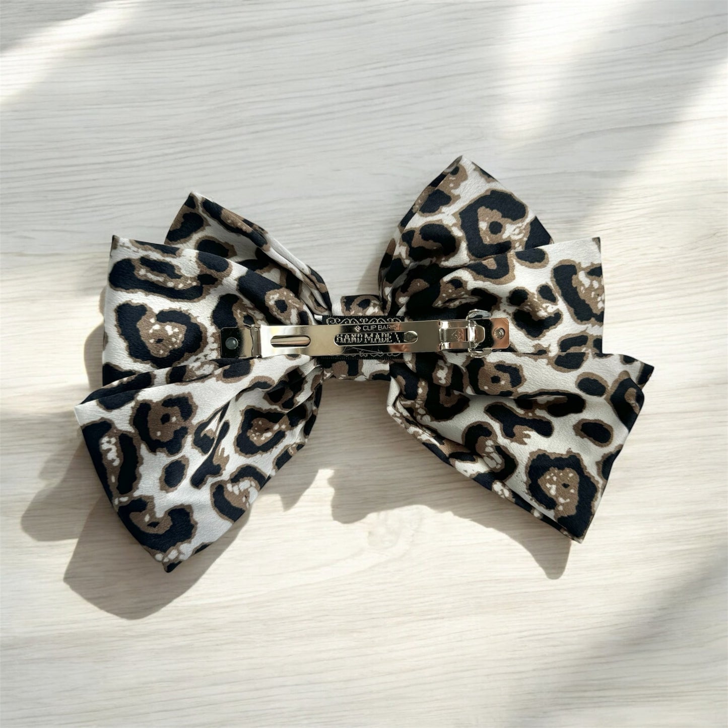 Animal Print Bow Barrette Clip: Wild & Stylish Hair Accessory