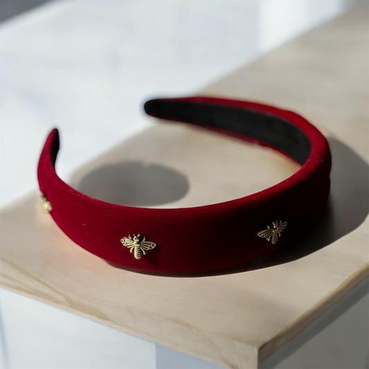 Golden Buzz: Bee-Band Headband with Striking Red and Gold Accents